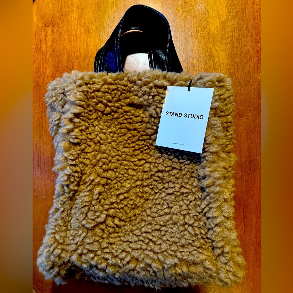 Stand Studio faux fur tote bag.